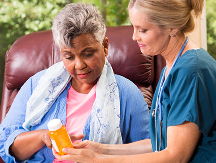 A doctor discusses medical information with a patient.